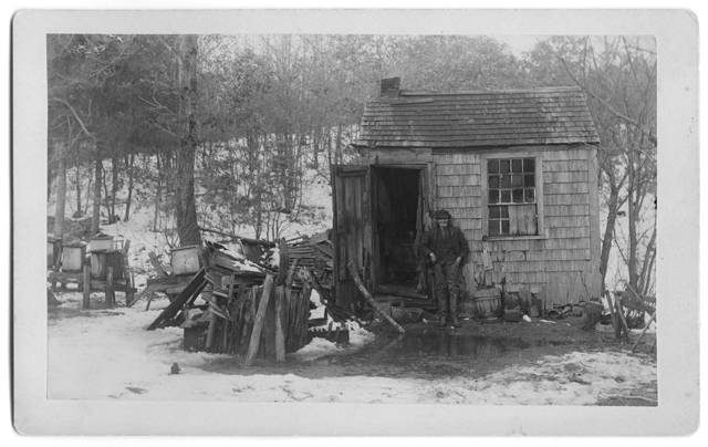 Dan Fuller the Hermit in front of his hut, 1893