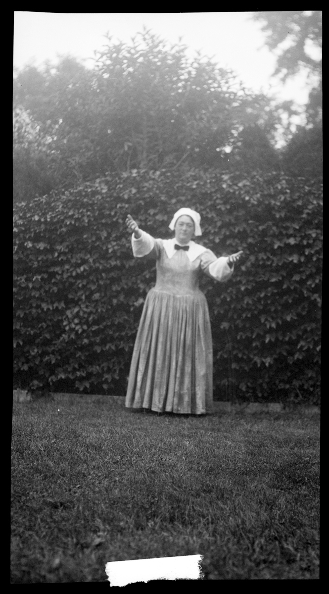 Emily Fuller Drews models a Pilgrim costume, circa 1920