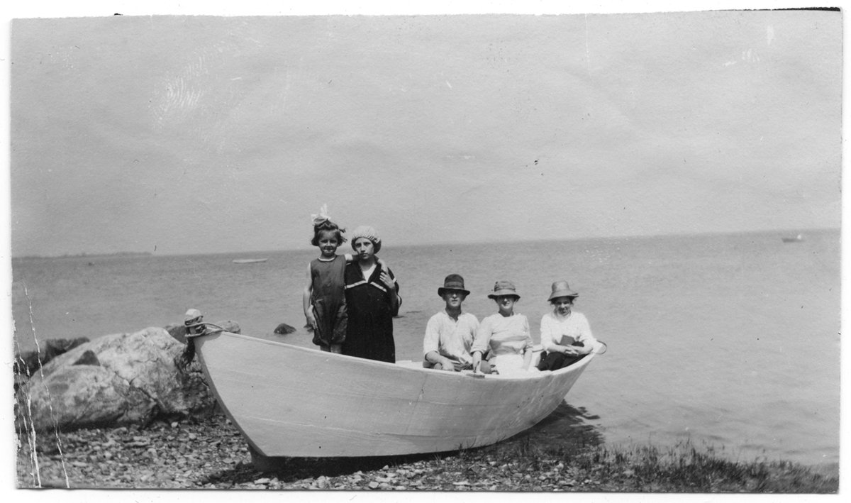 Five in a boat on the Rocky Nook shoreline, no date